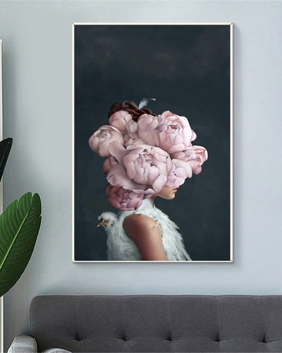 Penelopé Canvas showing an abstract woman portrait wearing nude roses on her head as well as a feather dress 
