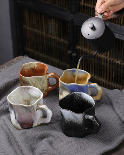 Handcrafted pottery ceramic porcelain mug irregular shape twisted polychromic multicolor beautiful modern retro nordic
