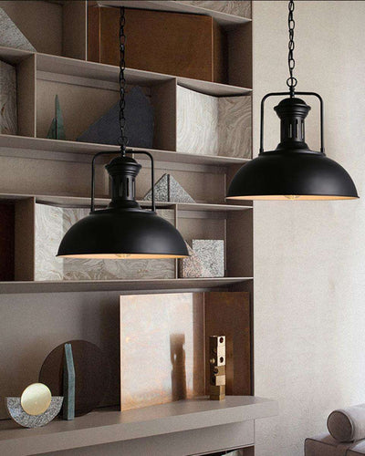 Two ceiling lamps in industrial black color hanging in a living room